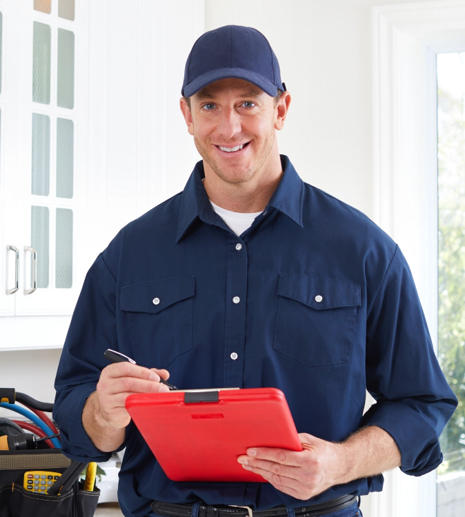 Man writing notes for HVAC Services in Calgary
