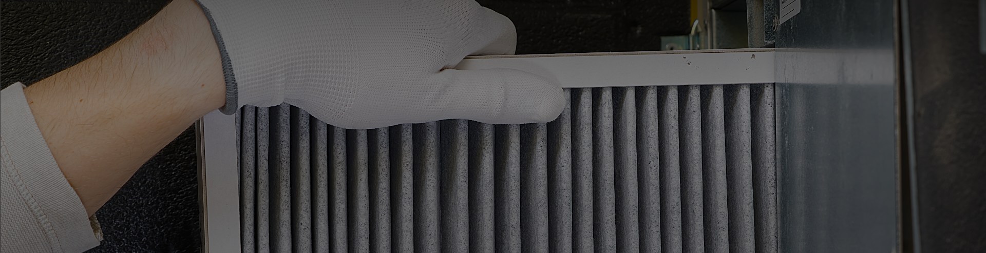 Man Installing Furnace Filter