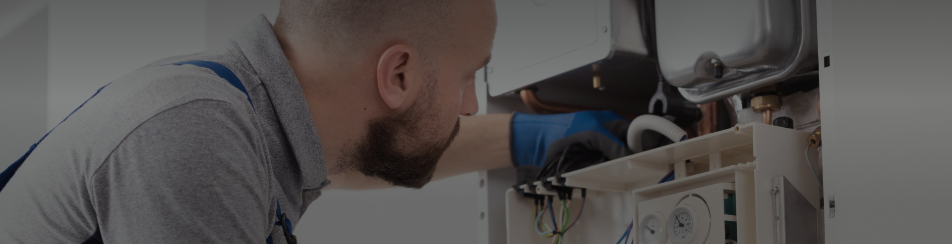 Man Installing Air Conditioner in Calgary