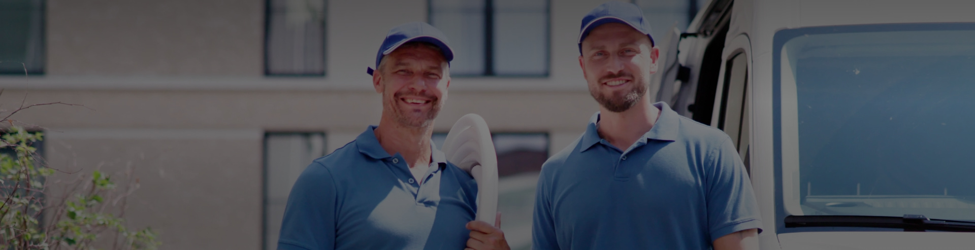 Two Men Happy After Air Conditioner Installation Calgary