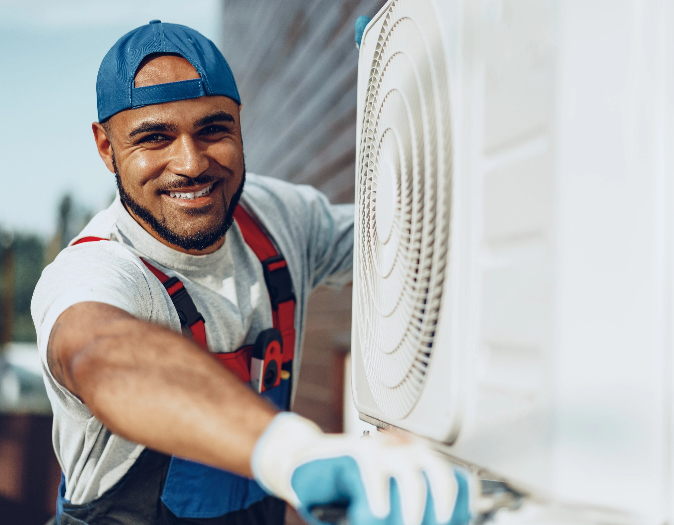 Man Doing Air Conditioner Installation in Calgary