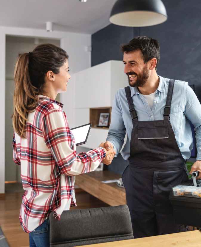 Man Talking to Woman for Humidifier Services in Calgary